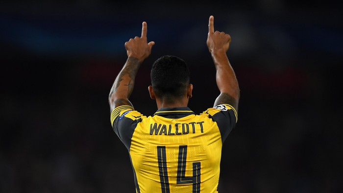 LONDON, ENGLAND - SEPTEMBER 28:  Theo Walcott of Arsenal ceclebrates after scoring the opening goal during the UEFA Champions League group A match between Arsenal FC and FC Basel 1893 at the Emirates Stadium on September 28, 2016 in London, England.  (Photo by Mike Hewitt/Getty Images)