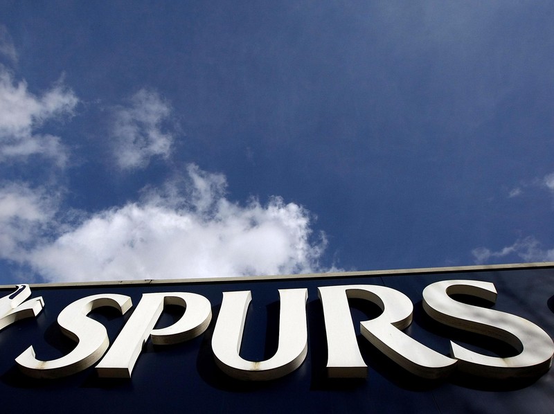 LONDON, ENGLAND - MARCH 09: A general view of  the Tottenham Hotspur Football Club logo above the club shop at White Hart Lane on March 9, 2011 in London, England. (Photo by Tom Dulat/Getty Images)