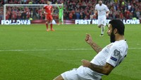 Tornike Okriashvili merayakan gol yang dicetak di menit ke-57. Rebecca Naden/Reuters/detikFoto.