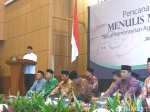 Menag Lukman Pimpin Ribuan Santri Se-Indonesia Menulis Mushaf