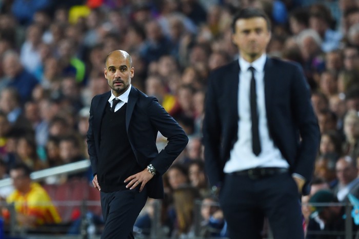 BARCELONA, SPAIN - MAY 06:  A dejected Josep Guardiola the head coach of Bayern Muenchen looks on past Luis Enrique the head coach of Barcelona during the UEFA Champions League Semi Final, first leg match between FC Barcelona and FC Bayern Muenchen at Camp Nou on May 6, 2015 in Barcelona, Spain.  (Photo by Shaun Botterill/Getty Images)