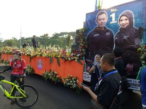 Deklarasi Kampaye Damai, Agus-Sylvi Pakai Tronton 9 Meter Penuh Bunga