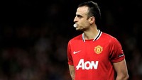 Pada 2008, Tottenham setuju menjual Dimitar Berbatov ke Manchester City, tetapi ketika sang striker terbang ke Manchester malah disambut oleh Alex Ferguson. Itu tidak menguntungkan untuk Spurs, karena tawaran City lebih baik, tetapi Berbatov ingin bergabung dengan United. (Foto: Michael Regan/Getty Image)