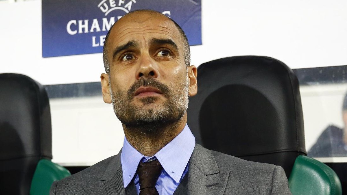Pep Guardiola meminta Barcelona tak banyak bicara soal hukuman UEFA  untuk Manchester City (Foto: REUTERS/Wolfgang Rattay)