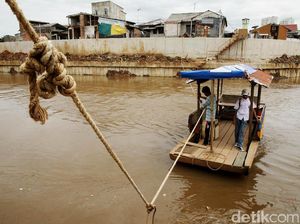 Potong Kompas Dengan Perahu Eretan