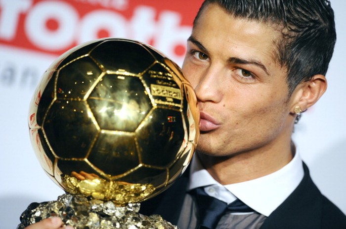Manchester United Portuguese winger Cristiano Ronaldo poses with his trophy after he received the European footballer of the year award, the 