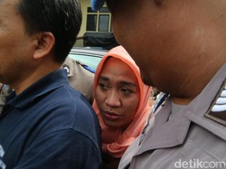 Selesai Diperiksa, Dora Natalia Tutupi Muka dan Bungkam