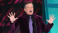 Robin Williams meninggal pada 11 Agustis 2014. Kejadian itu sehari setelah Ramsey menjebol gawang Manchester City di ajang Community Shield. (Kevork Djansezian/Getty Images)