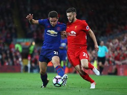 Duel Setan Merah vs Si Merah di Akhir Pekan