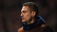 Nemanjad Vidic sebetulnya mampu tampil baik di Inter Milan setelah menuai sukses di MU. Namun, berbagai masalah cedera membuatnya harus pensiun pada Januari 2016. (Foto: Laurence Griffiths/Getty Images)