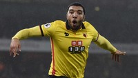 Troy Deeney merayakan gol usai membobol gawang Arsenal dalam pertandingan yang dihelat di Emirates Stadium,Rabu (1/2/2017) dinihari WIB. Tony OBrien/Reuters/detikFoto.