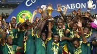 Kamerun memastikan gelar juara setelah memenik kemenangan 2-1 atas Mesir. Reuters/Mike Hutchings Livepic.