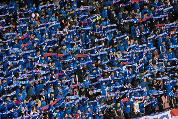 Shanghai Shenhua Fans hold scarves during the AFC Champions League 2017 play-off match between Shanghai Shenhua and Brisbane Roar in Shanghai, China, February 8, 2017. Picture taken February 8, 2017. REUTERS/Stringer ATTENTION EDITORS - THIS IMAGE WAS PROVIDED BY A THIRD PARTY. EDITORIAL USE ONLY. CHINA OUT. NO COMMERCIAL OR EDITORIAL SALES IN CHINA.