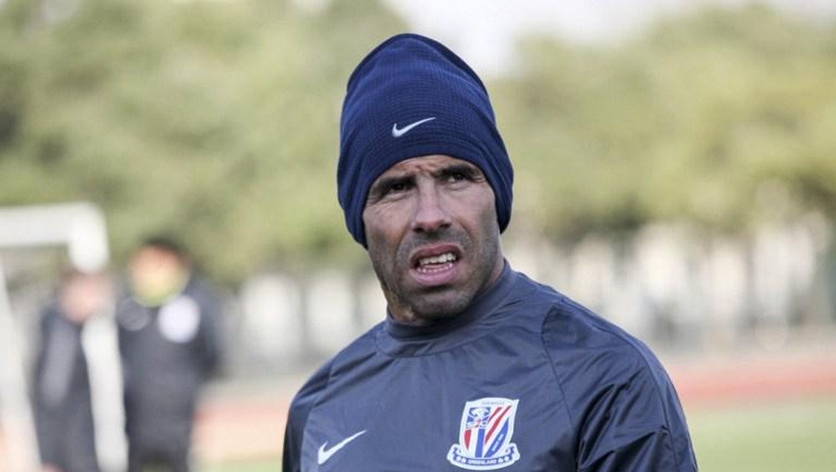 Carlos Tevez saat pertama berlatih bersama Shanghai Sinhua. AFP PHOTO / STR / China OUT)