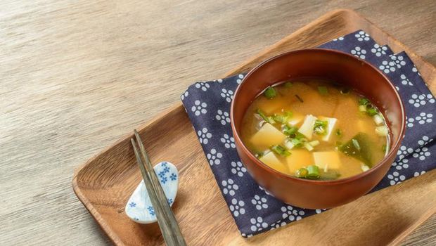 Chicken soup in ceramic bowl.