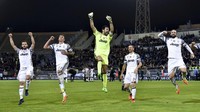 Para pemain Juventus merayakan gol. Tambahan tiga poin ini mengembalikan jarak Juve dan AS Roma di klasemen Serie A. Juve yang berada di urutan teratas kini unggul tujuh poin atas pesaing terdekatnya itu. Pool/Alberto Lingria/Reuters/detikFoto.