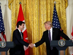 Pertemuan Pertama, Trump dan PM Kanada Berbeda Soal Pengungsi