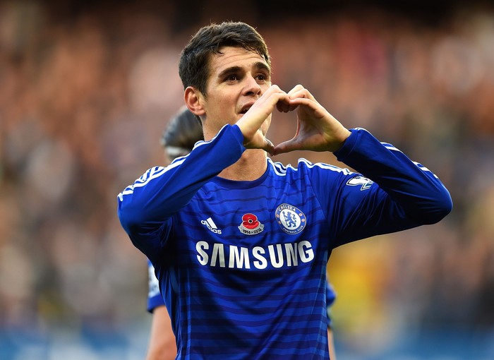 LONDON, ENGLAND - NOVEMBER 1: Oscar of Chelsea celebrates scoring the opening goal during the Barclays Premier League match between Chelsea and Queens Park Rangers at Stamford Bridge on November 1, 2014 in London, England. (Photo by Mike Hewitt/Getty Images)