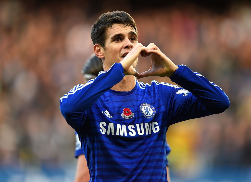 LONDON, ENGLAND - NOVEMBER 1: Oscar of Chelsea celebrates scoring the opening goal during the Barclays Premier League match between Chelsea and Queens Park Rangers at Stamford Bridge on November 1, 2014 in London, England. (Photo by Mike Hewitt/Getty Images)