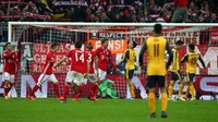 Thomas Muller merayakan gol di depan gawang Arsenal. Pool/Michael Dalder/Reuters/detikFoto.