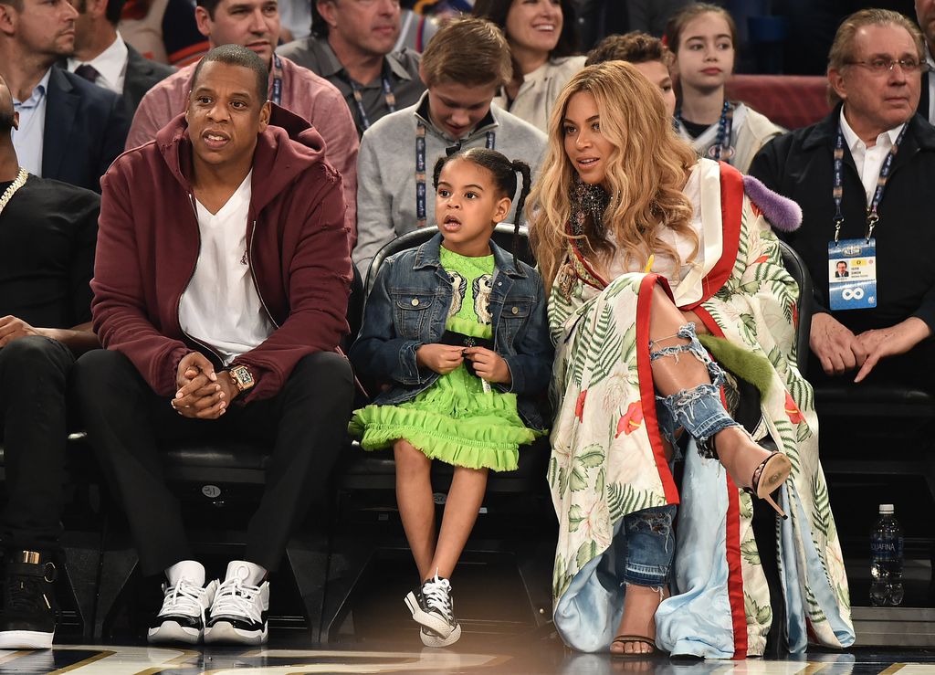 NEW ORLEANS, LA - FEBRUARY 19:  (L-R) Jay Z, Blue Ivy Carter and Beyoncé Knowles attend the 66th NBA All-Star Game at Smoothie King Center on February 19, 2017 in New Orleans, Louisiana.  (Photo by Theo Wargo/Getty Images)