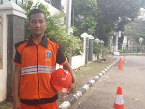 Got Hitam dan Totalitas Dadan Si Pasukan Oranye