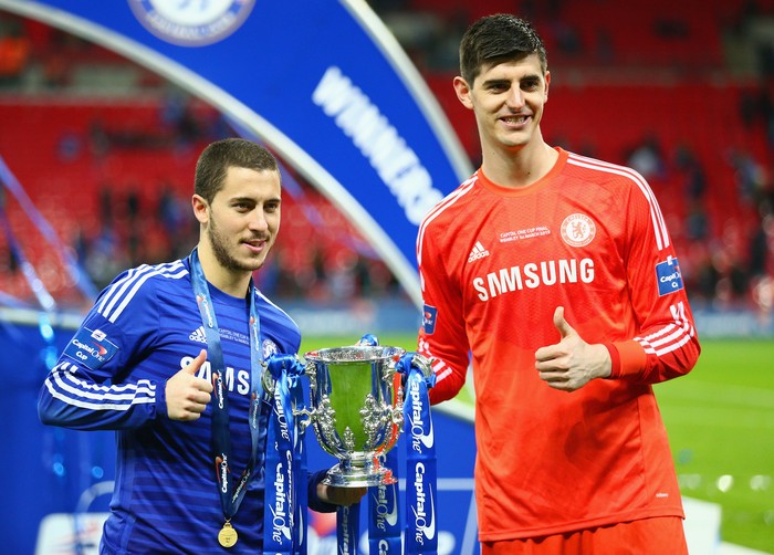 Hazard Courtois LONDON, ENGLAND - MARCH 01: Eden Hazard and Thibaut Courtois of Chelsea pose with the trophy during the Capital One Cup Final match between Chelsea and Tottenham Hotspur at Wembley Stadium on March 1, 2015 in London, England. (Photo by Clive Mason/Getty Images)