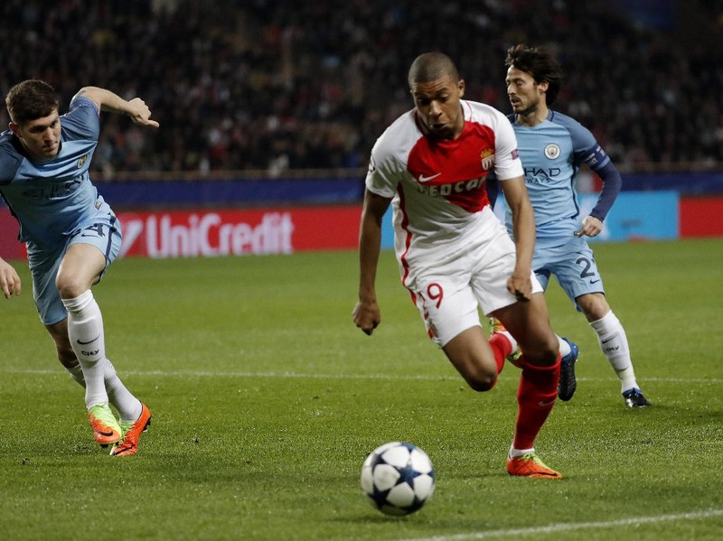 Soccer Football - AS Monaco v Manchester City - UEFA Champions League Round of 16 Second Leg - Stade Louis II, Monaco - 15/3/17 Monaco's Kylian Mbappe-Lottin in action with Manchester City's John Stones  Reuters / Eric Gaillard Livepic