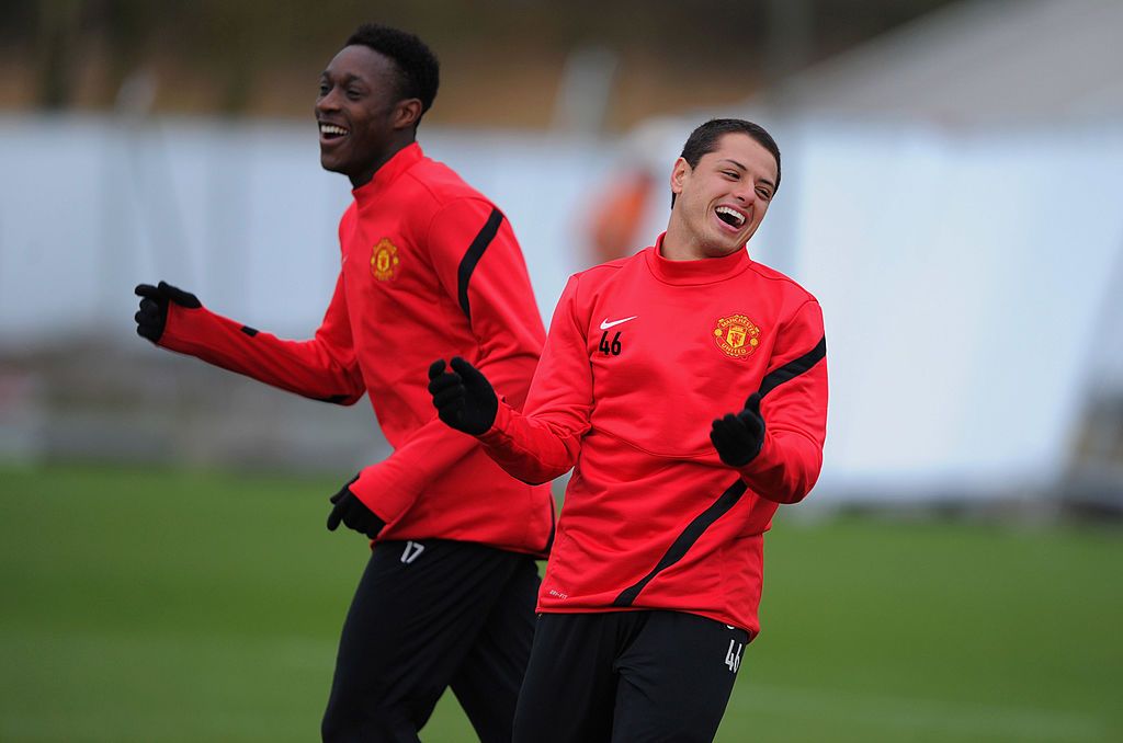 MANCHESTER, ENGLAND - FEBRUARY 22:  Javier Hernandez and Danny Welbeck share a joke during the Manchester United training ahead of their UEFA Europa League round of 32 second leg match against Ajax session at the Carrington Training Ground on February 22, 2012 in Manchester, England.  (Photo by Michael Regan/Getty Images)