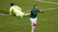 Sergio Romero merayakan gol. Pool/Manuel Claure/Reuters.