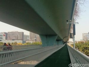 Menjajal Jalur Sepeda Layang Pertama di China