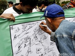 Tanda Tangannya Unik Bergambar Anak Kucing, Pria Ini Jadi Viral