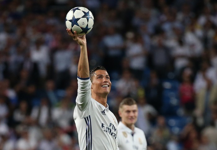 Football Soccer - Real Madrid v Bayern Munich - UEFA Champions League Quarter Final Second Leg - Estadio Santiago Bernabeu, Madrid, Spain - 18/4/17 Real Madrid's Cristiano Ronaldo celebrates after the game with the match ball after scoring a hat trick Reuters / Sergio Perez Livepic
