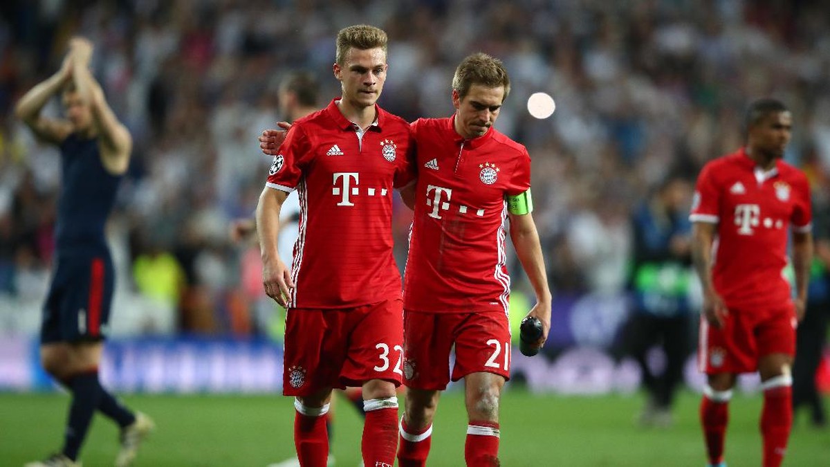 Joshua Kimmich dan Philipp Lahm. Foto: Michael Dalder/Reuters