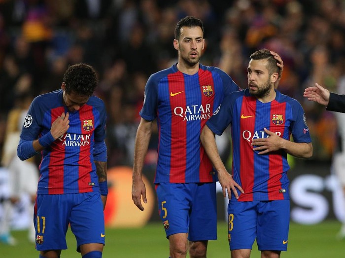 Football Soccer - FC Barcelona v Juventus - UEFA Champions League Quarter Final Second Leg - The Nou Camp, Barcelona, Spain - 19/4/17 Barcelona's Lionel Messi, Sergio Busquets and Jordi Alba look dejected after the match  Reuters / Albert Gea Livepic