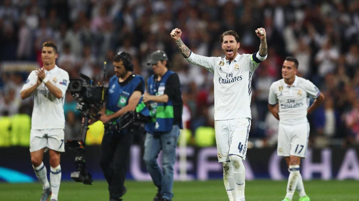 Sergio Ramos merayakan kemenangan atas Atletico Madrid di semifinal Liga Champions. Dia optimistis Madrid mempertahankan gelar. (Foto: Lars Baron/Getty Images)