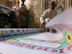 Pria Mesir Buat Alquran Sepanjang 700 Meter dengan Ditulis Tangan