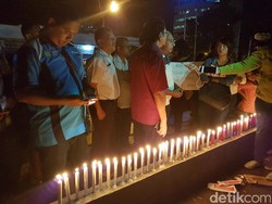 Nyala Lilin dan Suara Warga Papua untuk Ahok