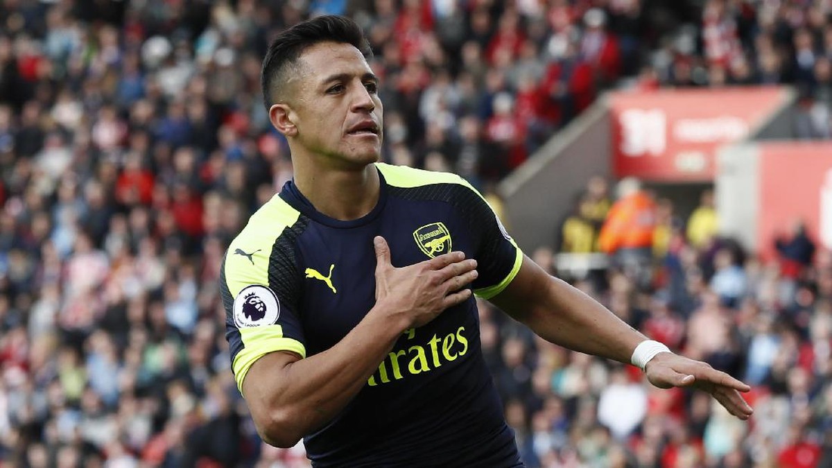 Alexis Sanchez merayakan gol ke gawang Stoke City (Foto: Reuters / Stefan Wermuth)