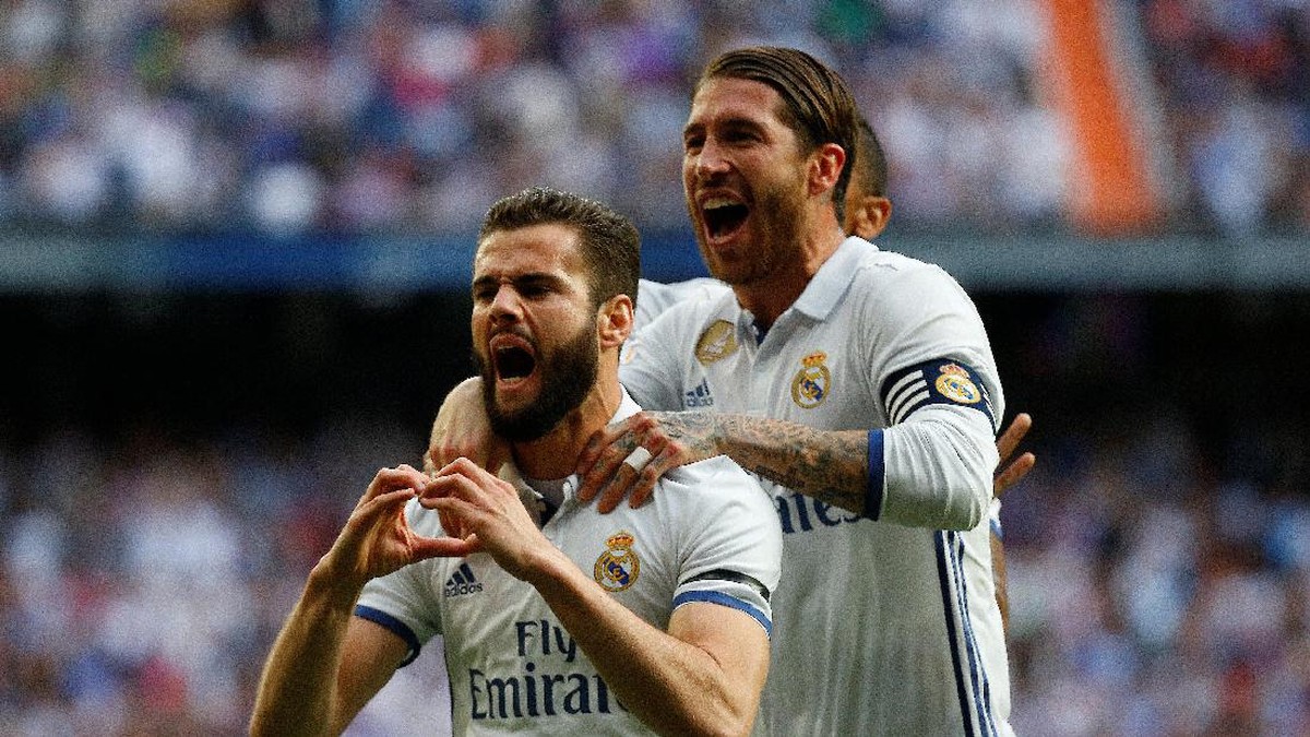 Nacho merayakan gol tendangan bebasnya ke gawang Sevilla. (Foto: Reuters / Paul Hanna)