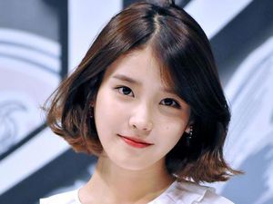 Pidato Emosional IU di Golden Disc Awards untuk Jonghyun SHINee