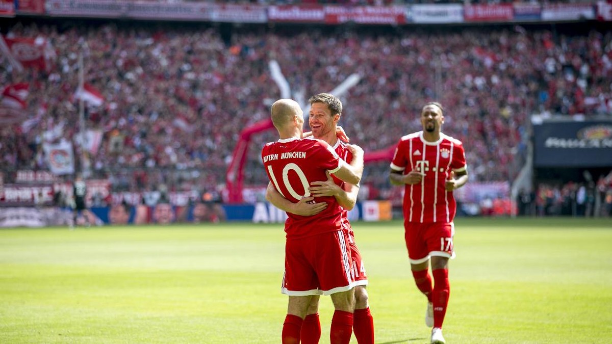 Xabi Alonso resmi pensiun dari kareir profesionalnya. Foto: Jan Hetfleisch/Getty Images for MAN