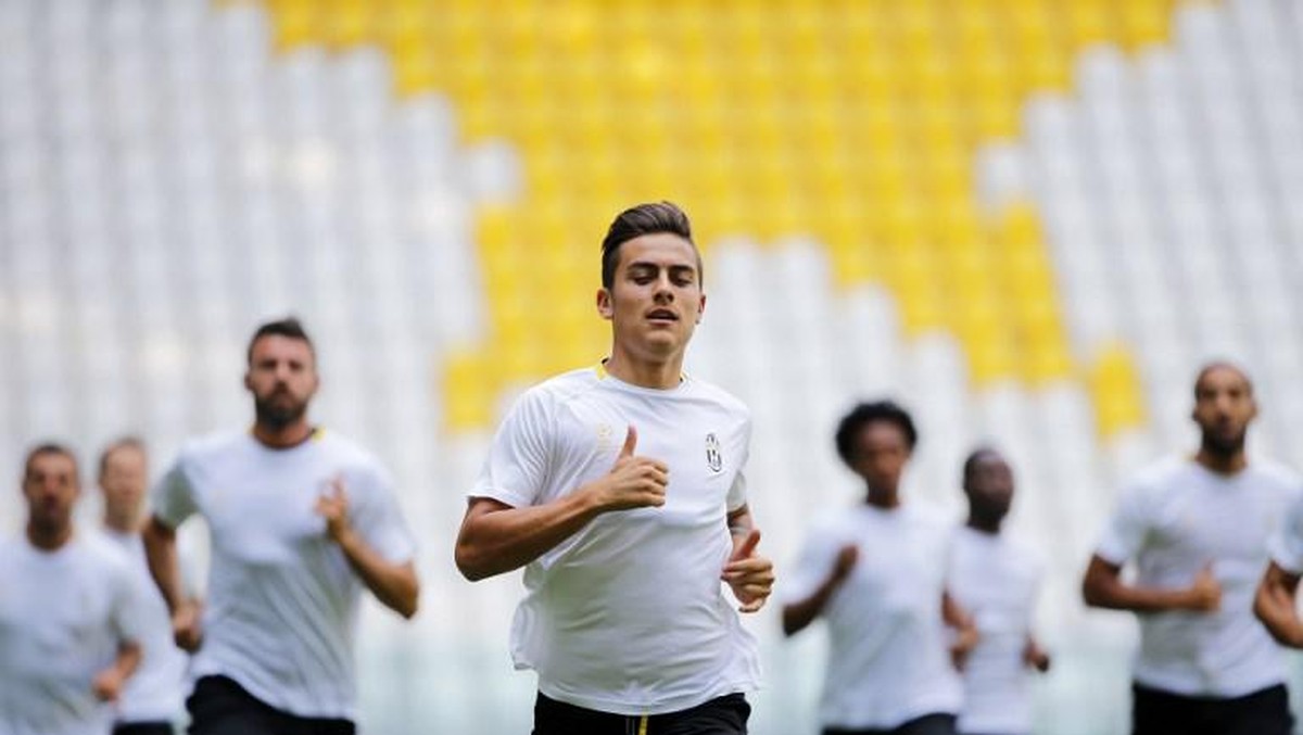 Paulo Dybala tak berniat tinggalkan Juventus. Foto: AFP PHOTO / Marco BERTORELLO