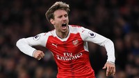 Arsenal menaklukkan Brighton dan Hove Albin dua gol tanpa balas. Nacho Monreal menjadi salah satu pencetak gol kemenangan. (Foto: Shaun Botterill/Getty Images)
