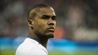 Kedatangan James ke Bayern Munich membuat Douglas Costa hengkang ke Juventus. Pada Rabu (12/7), ia resmi dipinjamkan ke Bianconeri selama dua musim dengan transfer senilai 6 juta euro plus opsi dipermanenkan. (Odd ANDERSEN/AFP)