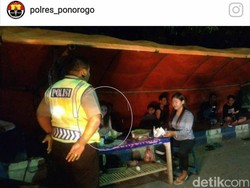 Heboh Wanita Misterius dalam Foto Patroli Polisi