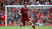 Philippe Coutinho masih terus diganggu isu seputar kepindahannya ke Barcelona. Sementara, Liverpool sendiri masih ngotot tak mau menjualnya. Seperti apa endingnya? (Jan Kruger/Getty Images)