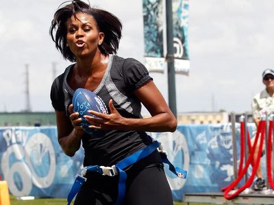 Foto: Gaya Sporty Michelle Obama yang Seksi dan Memukau