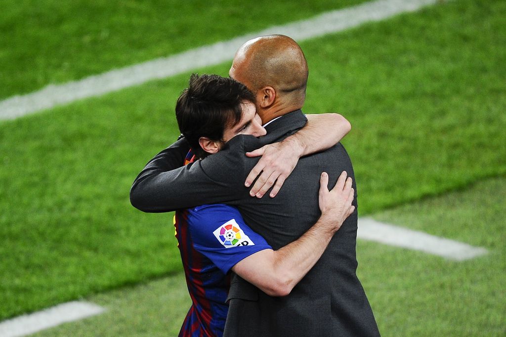 BARCELONA, SPAIN - MAY 05:  Lionel Messi of FC Barcelona (R) hugs his Head coach Josep Guardiola of FC Barcelona after scoring his team's third goal during the La Liga match between FC Barcelona and RCD Espanyol at Camp Nou on May 5, 2012 in Barcelona, Spain. This is the last match as head coach of FC Barcelona for Josep Guardiola at the Camp Nou Stadium.  (Photo by David Ramos/Getty Images)