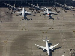 Penerbangan di China Ditunda Setelah Nenek Lempar Koin ke Pesawat